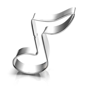 May include: A shiny, silver-colored cookie cutter in the shape of a musical eighth note. The cutter is made of metal and has a smooth, reflective surface. The design is a classic representation of a musical note, perfect for baking themed treats.