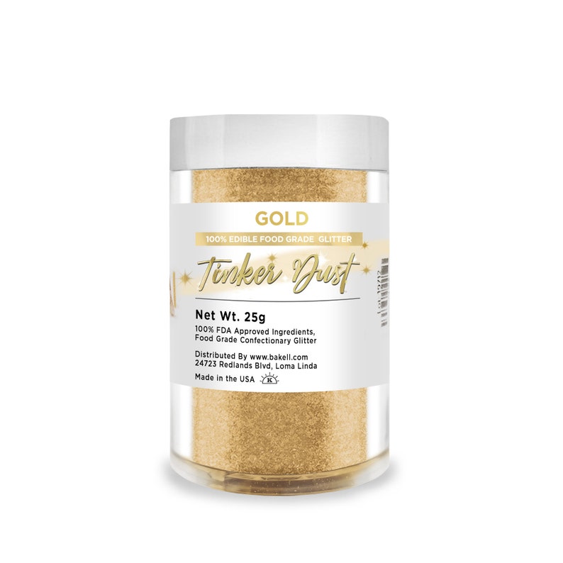 Może przedstawiać: Przezroczysty plastikowy słoik wypełniony złotym, jadalnym brokatem. Etykieta głosi "GOLD" i "Tinker Dust". Słoik zawiera 25g brokatu i jest wykonany w 100% ze składnik&oacute;w zatwierdzonych przez FDA. Jest to brokat spożywczy.