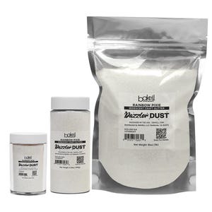 May include: Three containers of iridescent craft glitter labeled "Dazzler Dust" by Bakell. The containers vary in size, with the largest being a clear bag containing 16 oz of glitter. The smaller containers have a net weight of 3.53 oz.