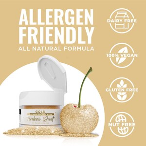Może przedstawiać: Otwarty słoik złotego jadalnego brokatu z napisem "Tinker Dust" obok pokrytej brokatem wiśni. Obraz zawiera tekst "Allergen Friendly", "All Natural Formula" oraz ikony dla produkt&oacute;w bezmlecznych, wegańskich, bezglutenowych i bez orzech&oacute;w.
