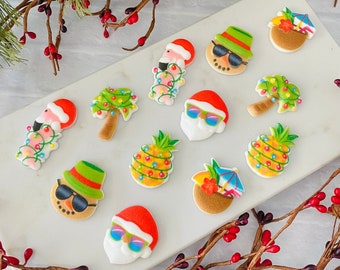 TROPICAL CHRISTMAS ASSORTMENT Edible Sugar Cupcake or Cake Toppers - 12 Pieces - Santa, Flamingo, Pineapple, Coconut, Palm Tree, Snowman