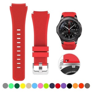 May include: A red silicone watch band with a diagonal textured pattern, featuring a silver buckle and a matching red watch face with a black dial. A circular inset shows the quick-release pin mechanism connecting the band to the watch casing.