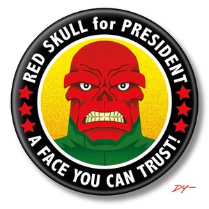 May include: A black and red button with a white background. The button features a cartoon image of Red Skull, a Marvel Comics supervillain, with the text "RED SKULL for PRESIDENT A FACE YOU CAN TRUST!" around the image.