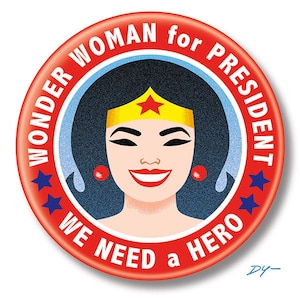 May include: Red and blue button with a white star in the center. The button says "Wonder Woman for President" and "We Need a Hero".