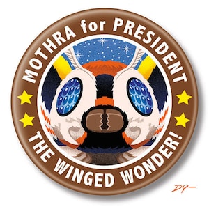 May include: A brown button with a cartoon image of Mothra, a giant moth from the Godzilla franchise, with the text "Mothra for President The Winged Wonder!" around the image.