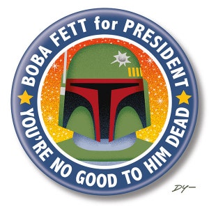 May include: A blue and yellow circular button with a white star on each side. The button features a cartoon image of Boba Fett's helmet with the text "BOBA FETT for PRESIDENT YOU'RE NO GOOD TO HIM DEAD".