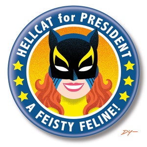 May include: A blue and yellow button with a cartoon image of a woman wearing a black cat mask. The text on the button reads "Hellcat for President A Feisty Feline!"