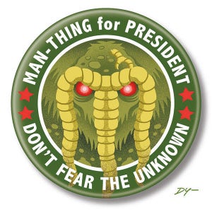 May include: A green button with a white border and red stars. The button features a cartoon monster with yellow tentacles and red eyes. The text on the button reads "Man-Thing for President Don't Fear the Unknown."
