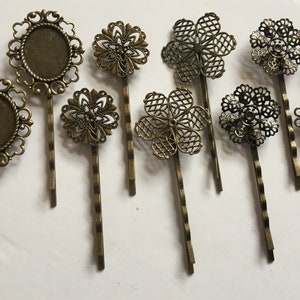 May include: Ten bronze hair clips with decorative floral and round designs. The clips have a vintage look and are perfect for adding a touch of elegance to any hairstyle.