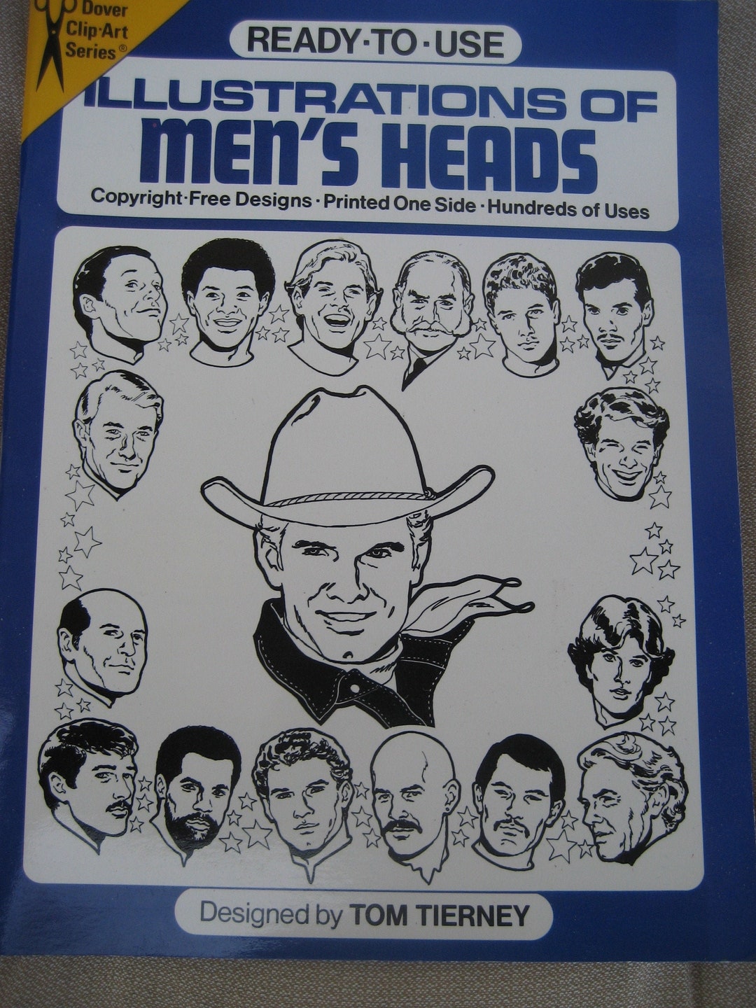 Dover Clipart Book, Illustrations of Men's Heads, by Tom Tierney, 1982