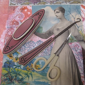 May include: A set of three vintage pink and white plastic sewing tools. The tools include a thimble, a hook for pulling on a thread, and a pair of small scissors.
