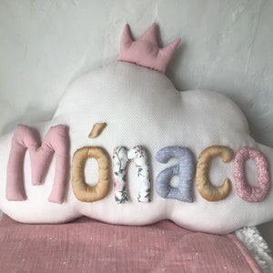 Cushion cloud personalized with name.