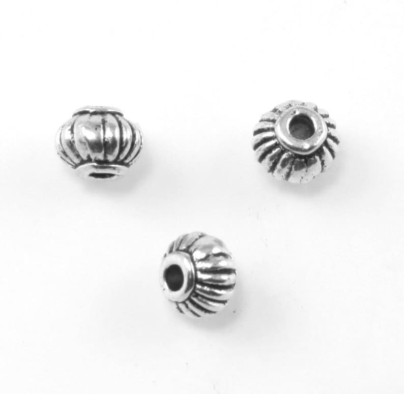 Silver Spacer Beads Ribbed Textured Finding 5mm Jewelry Lot of 50 Silver Spacer Beads Ribbed Textured Finding 5mm Jewelry Lot of 50