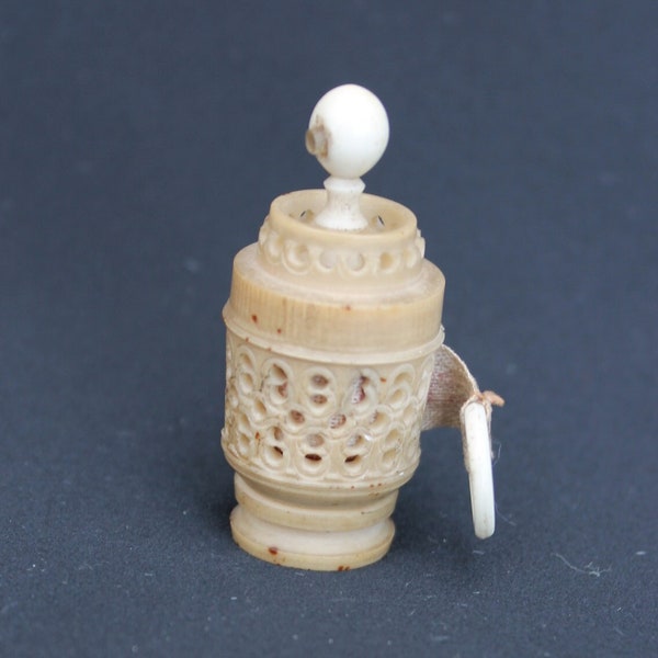 Victorian Stanhope tape measure, vegetable ivory sewing accessory with picture viewer of Truro, antique barrel pull out tape measure