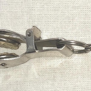 Skirt lifter, antique silver clip, hook and belt loop, Victorian fashion accessory.