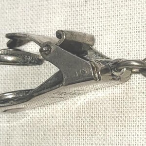 Antique skirt lifter, silver tone Victorian accessory, 'The Crown Patent'