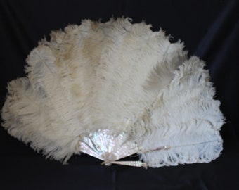 Edwardian large off white ostrich feather fan, spares or repair, gilded mother of pearl, antique Victorian 19th century burlesque style fan