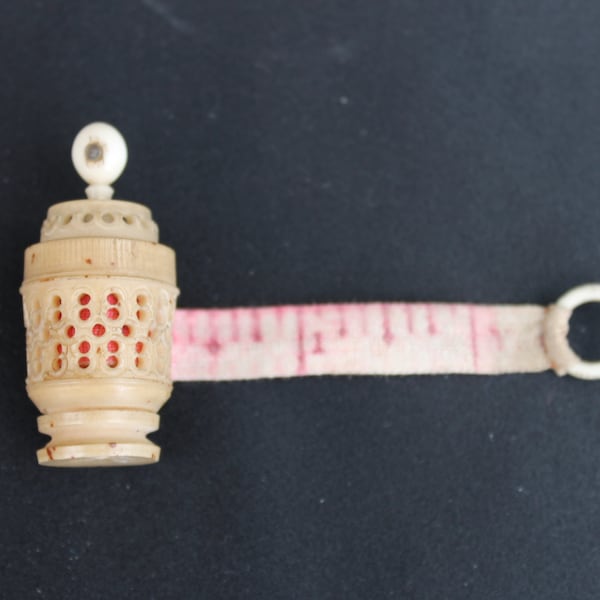 Victorian Stanhope tape measure, antique vegetable ivory carved sewing accessory with picture viewer of Truro, barrel pull out tape measure