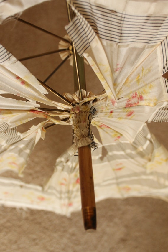 Victorian umbrella frame, Edwardian long parasol, the… Gem