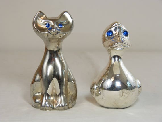 Bron inschakelen ui Zilveren Toon metalen kat & eend beeldjes met blauwe ogen | Etsy Nederland