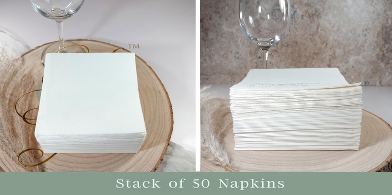 May include: A stack of 50 white paper napkins on a wooden surface. The napkins are folded and stacked neatly.