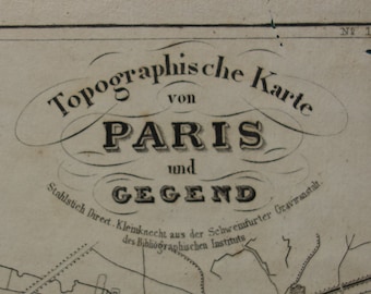 May include: A black and white topographic map of Paris and its surrounding area. The map is titled "Topographische Karte von Paris und Gegend." The map shows the names of various towns and cities, including Bobigny, Pantin, Noisy le See, and Bondy.