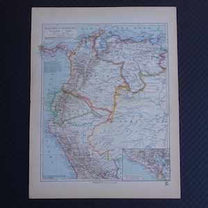 May include: A detailed vintage map print showing Colombia, Venezuela, Ecuador, and Peru. The map uses a variety of colours to highlight borders, cities, and geographical features. The title is printed in German.