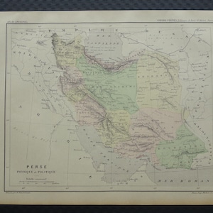 May include: Antique map of Persia, featuring detailed geographical information. The map is printed on aged paper with faded colors, including green, pink, and yellow. Text in French reads "PERSE PHYSIQUE et POLITIQUE".