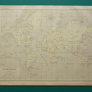 May include: An antique world map, titled "PLANISPHERE," features detailed geographical information. The map, printed in French, displays continents, oceans, and countries in a vintage style, with a grid overlay and aged paper.