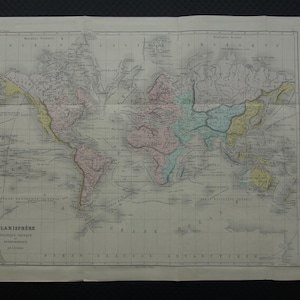 May include: Vintage world map showing continents in pink, yellow, and green, with detailed geographical features. The map is labelled "PLANISPHERE" with French text. The map is printed on aged paper with visible creases and folds.