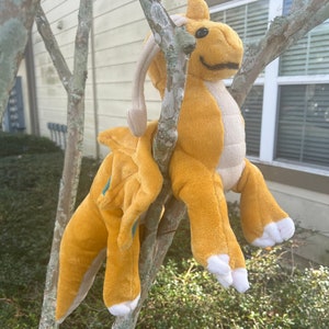 Golden floppy dragon plush