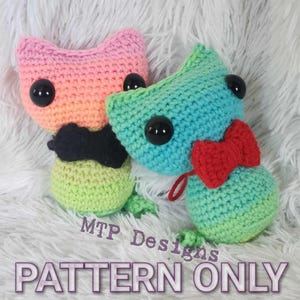 May include: Two crocheted cat amigurumi toys. One is pink, orange, and green with a black mustache. The other is blue, green, and red with a red bow tie. The text "MTP Designs PATTERN ONLY" is below the toys.
