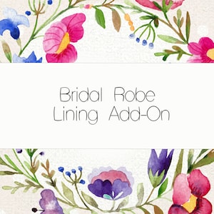 May include: A watercolor illustration of a floral wreath with pink, purple, and blue flowers. The text "Bridal Robe Lining Add-On" is in the center of the image.