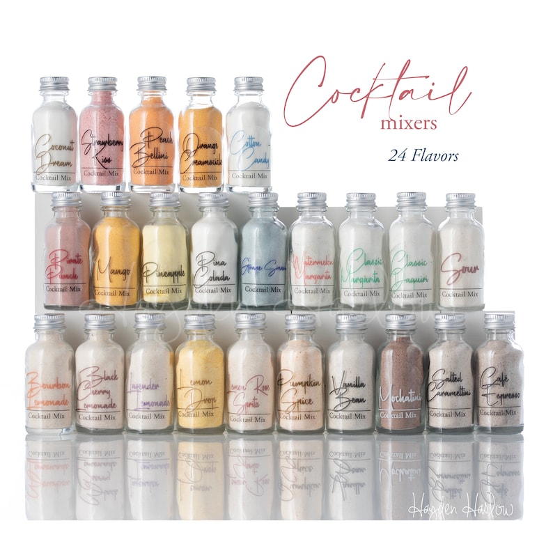 May include: A collection of 24 small glass bottles with silver lids, each filled with a different colored powder. The bottles are labeled with various cocktail flavors, such as "Coconut Dream", "Strawberry Kiss", "Peach Bellini", "Orange Creamsicle", "Mango", "Pineapple", "Pina Colada", "Stone Sour", "Watermelon Margarita", "Classic Margarita", "Sour", "Bourbon Lemonade", "Black Cherry Lemonade", "Lavender Lemonade", "Lemon Drop", "Lemon Rose Spritz", "Pumpkin Spice", "Vanilla Bean", "Mochachino", "Salted Caramel", "Cafe Espresso", and "Haglen Hallow". The bottles are arranged in three rows of eight bottles each. The text "Cocktail Mix" appears on each bottle label. The text "Cocktail mixers" and "24 Flavors" appears above the bottles.