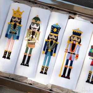 Luxe Nutcracker Christmas embroidered, linen hemstitched dinner napkins | set of  4, 6, 12