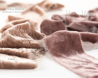 May include: Two rolls of silk velvet ribbon, one in camel and one in vintage mauve. The ribbon is handmade and hand dyed. The text "Silk Velvet Ribbon Handmade & Hand Dyed" and "Hayden Harlow" is visible in the image.