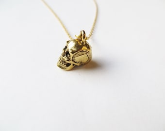 Skull Necklace, gold skull charm, skull pendant, human body, trending jewellery, latest fashion, gold chain, birthday gift