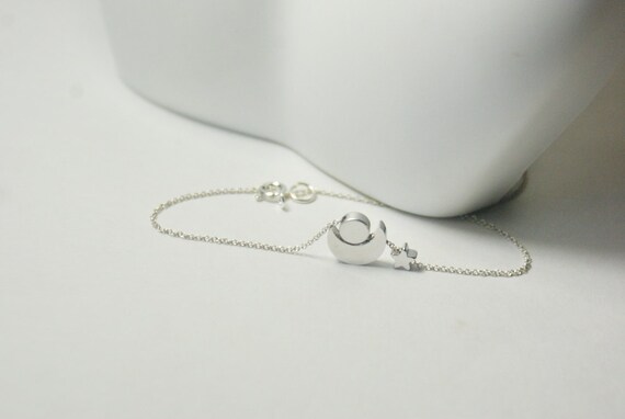 Pulsera estilo oriental luna y flores