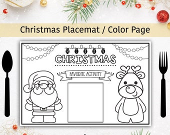 May include: Black and white Christmas placemat with Santa Claus and a reindeer. The placemat has the text "Merry Christmas" and "Favorite Activity". Includes a black spoon and fork on either side.