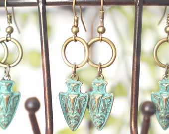Dangle earrings. Turquoise arrow.