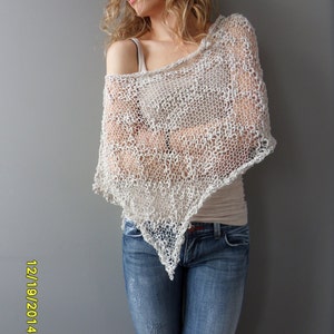 Ivory cotton summer poncho. Loose knit poncho. Summer knitwear.