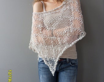Ivory cotton summer poncho. Loose knit poncho. Summer knitwear.