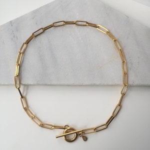 Handgemaakte gouden ketting met T-vormige ketting