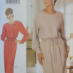 May include: A sewing pattern for a dress with a tie waist. The pattern is for sizes 18-22 and is by Butterick. The pattern is for a dress with a tie waist. The pattern is for sizes 18-22 and is by Butterick.