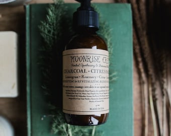 Charcoal + Citrus Face Wash • Lemongrass + Rosemary + Citrus + Lemon Verbena • Deeply Cleansing + Revitalizing blend for all skin types
