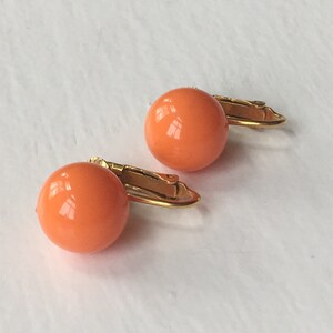Vintage Orange Globe Clip Ons