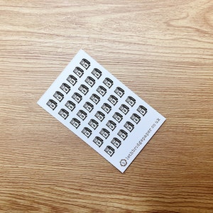 May include: A sheet of stickers featuring a black and white illustration of a petrol pump. The sheet contains 49 stickers and has the text "lethbridgepaper.co.uk" in the bottom right corner.