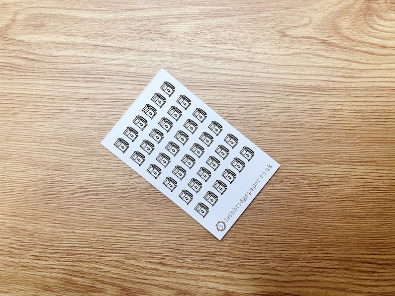 May include: A sheet of stickers featuring a black and white illustration of a petrol pump. The sheet contains 49 stickers and has the text "lethbridgepaper.co.uk" in the bottom right corner.
