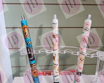 Cats & dogs pen wrap pens.  Pitbull turquoise wrap with Lots of vibrant colors.  White cat resin pen/ white chihuahuas resin pen, only 1 pen