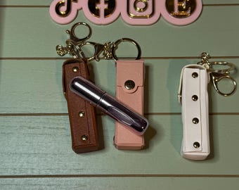 Mini perfume atomizer case faux leather / perfume bottle for travel/ purse/backpack or pocket.  Holds 5ml aluminum perfume bottle